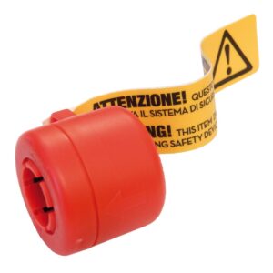 AdBlue Magnetadapter är en röd säkerhetsspärranordning i plast med en gul varningsetikett som är delvis utdragen, med text på italienska och engelska och ett svart utropstecken inuti en triangel.