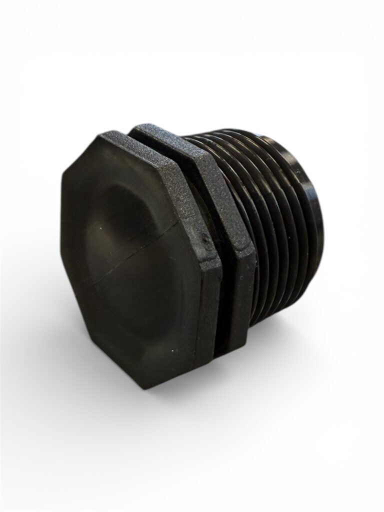 En PP Plugg med utvändig gänga, tillverkad av svart plast med sexkantigt huvud, visas mot en vit bakgrund.